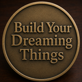 BYDT Crest Medallion back: raised Build Your Dreaming Things lettering on a textured bronze field