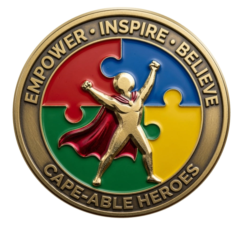Interactive 3D Dream Builder Medallion: rotate to explore the Cape-Able Heroes front and illustrated BYDT back. Presentation model; dimensions and relief are approximate.
